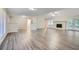 Bright living room with hardwood floors, fireplace and neutral color palette at 443 Creekwood Pass, Dallas, GA 30157