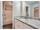 Updated bathroom with granite vanity and a tub shower combo at 443 Creekwood Pass, Dallas, GA 30157