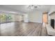 Spacious living room featuring hardwood floors, a fireplace and lots of natural light at 443 Creekwood Pass, Dallas, GA 30157