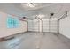 Two-car garage with automatic openers and window at 443 Creekwood Pass, Dallas, GA 30157