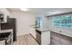 Modern kitchen with white shaker cabinets, granite counters and stainless steel appliances at 443 Creekwood Pass, Dallas, GA 30157