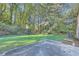 Spacious backyard with a grassy area and a patio at 4660 Edwina Sw Ln, Atlanta, GA 30331