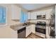 Modern kitchen featuring stainless steel appliances and granite countertops at 4660 Edwina Sw Ln, Atlanta, GA 30331
