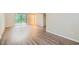 Finished basement with wood-look flooring and sliding glass door at 4660 Edwina Sw Ln, Atlanta, GA 30331