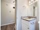 Clean bathroom with granite countertop and updated fixtures at 4660 Edwina Sw Ln, Atlanta, GA 30331