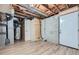Unfinished basement with exposed utilities and exterior access at 4660 Edwina Sw Ln, Atlanta, GA 30331