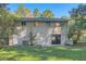Ranch style home with a carport and mature trees at 4660 Edwina Sw Ln, Atlanta, GA 30331