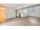 Finished basement area with wood-look flooring and access to bathroom at 4660 Edwina Sw Ln, Atlanta, GA 30331