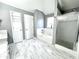 Elegant bathroom with marble flooring, soaking tub, and walk-in shower at 300 Redford Trl, Stockbridge, GA 30281