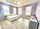 Large bedroom with light walls and wood flooring at 300 Redford Trl, Stockbridge, GA 30281