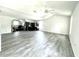 Spacious bonus room with gray vinyl plank flooring at 300 Redford Trl, Stockbridge, GA 30281