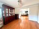 Bright dining room with hardwood floors and a hutch at 300 Redford Trl, Stockbridge, GA 30281