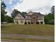 Two-story house with brick and siding exterior at 300 Redford Trl, Stockbridge, GA 30281