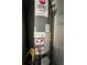 Picture of a water heater with safety labels at 300 Redford Trl, Stockbridge, GA 30281