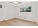 Bright bedroom with wood-look floors and a large closet at 2045 Pine Oak Dr, Atlanta, GA 30310