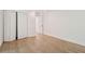 Spacious bedroom with wood-look floors and a large closet at 2045 Pine Oak Dr, Atlanta, GA 30310