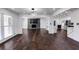 Spacious living room with hardwood floors and open floorplan at 1664 Womack Rd, Dunwoody, GA 30338