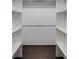 Large walk-in closet with ample shelving and hanging space at 1664 Womack Rd, Dunwoody, GA 30338