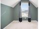 Simple bedroom with window, neutral walls and carpet at 2608 Downing Park Se Dr, Conyers, GA 30094