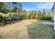 Large backyard with grassy area and privacy at 2608 Downing Park Se Dr, Conyers, GA 30094