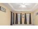 Spacious bedroom with neutral walls, ceiling fan, and ample window light at 2608 Downing Park Se Dr, Conyers, GA 30094