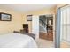 Bedroom with a queen bed, views of the upper hallway and staircase at 2608 Downing Park Se Dr, Conyers, GA 30094