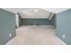 Bonus room with neutral walls and carpet, ideal as a home gym at 2608 Downing Park Se Dr, Conyers, GA 30094