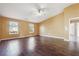 Spacious living room featuring dark wood floors and vaulted ceilings at 1243 Royal Ives Ct, Lawrenceville, GA 30045