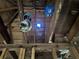 Unfinished attic space with exposed wiring and beams at 879 Edwin Nw Pl, Atlanta, GA 30318