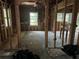 Unfinished kitchen, studs and flooring are visible at 879 Edwin Nw Pl, Atlanta, GA 30318