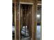 Unfinished hallway with exposed framing and flooring at 879 Edwin Nw Pl, Atlanta, GA 30318