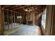 Under construction living room with exposed framing at 879 Edwin Nw Pl, Atlanta, GA 30318