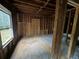 Unfinished bedroom with exposed studs and flooring at 879 Edwin Nw Pl, Atlanta, GA 30318
