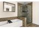 Elegant bathroom with soaking tub and a large glass shower at 270 17Th Nw St # 2410, Atlanta, GA 30363