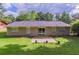 Brick home with spacious backyard, patio, and mature trees at 2895 Springfield Ct, Atlanta, GA 30349