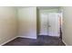 Simple bedroom with gray carpet and double door closet at 2895 Springfield Ct, Atlanta, GA 30349