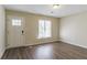 Bright living room featuring hardwood floors and neutral walls at 2895 Springfield Ct, Atlanta, GA 30349