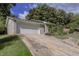 Brick home with a long driveway and a landscaped yard at 2895 Springfield Ct, Atlanta, GA 30349