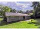 Brick home with spacious backyard, patio, and mature trees at 2895 Springfield Ct, Atlanta, GA 30349