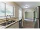 Updated kitchen with granite countertops and stainless steel appliances at 2895 Springfield Ct, Atlanta, GA 30349