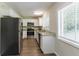 Renovated kitchen with stainless steel appliances and granite countertops at 2895 Springfield Ct, Atlanta, GA 30349