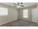Bedroom with ceiling fan, neutral walls, and window with blinds at 2895 Springfield Ct, Atlanta, GA 30349