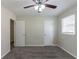 Bright bedroom with ceiling fan and two closets at 2895 Springfield Ct, Atlanta, GA 30349