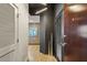 Stylish hallway with wood floors and artwork at 400 W Peachtree Nw St # 1204, Atlanta, GA 30308