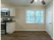 Spacious dining area with hardwood floors and large window at 541 N Hairston Rd, Stone Mountain, GA 30083