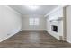 Finished basement featuring a fireplace and dark flooring at 541 N Hairston Rd, Stone Mountain, GA 30083