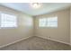 Cozy bedroom with neutral decor and large windows at 541 N Hairston Rd, Stone Mountain, GA 30083