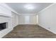 Spacious basement with fireplace and neutral tones at 541 N Hairston Rd, Stone Mountain, GA 30083