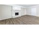 Bright basement features a fireplace and LVP flooring at 541 N Hairston Rd, Stone Mountain, GA 30083