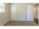 Simple bedroom with carpet flooring and neutral walls at 541 N Hairston Rd, Stone Mountain, GA 30083